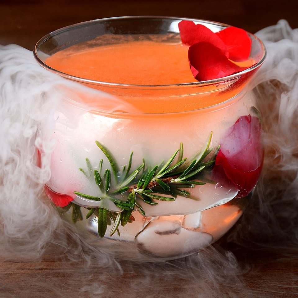 Rose-petal cocktail with dramatic smoke