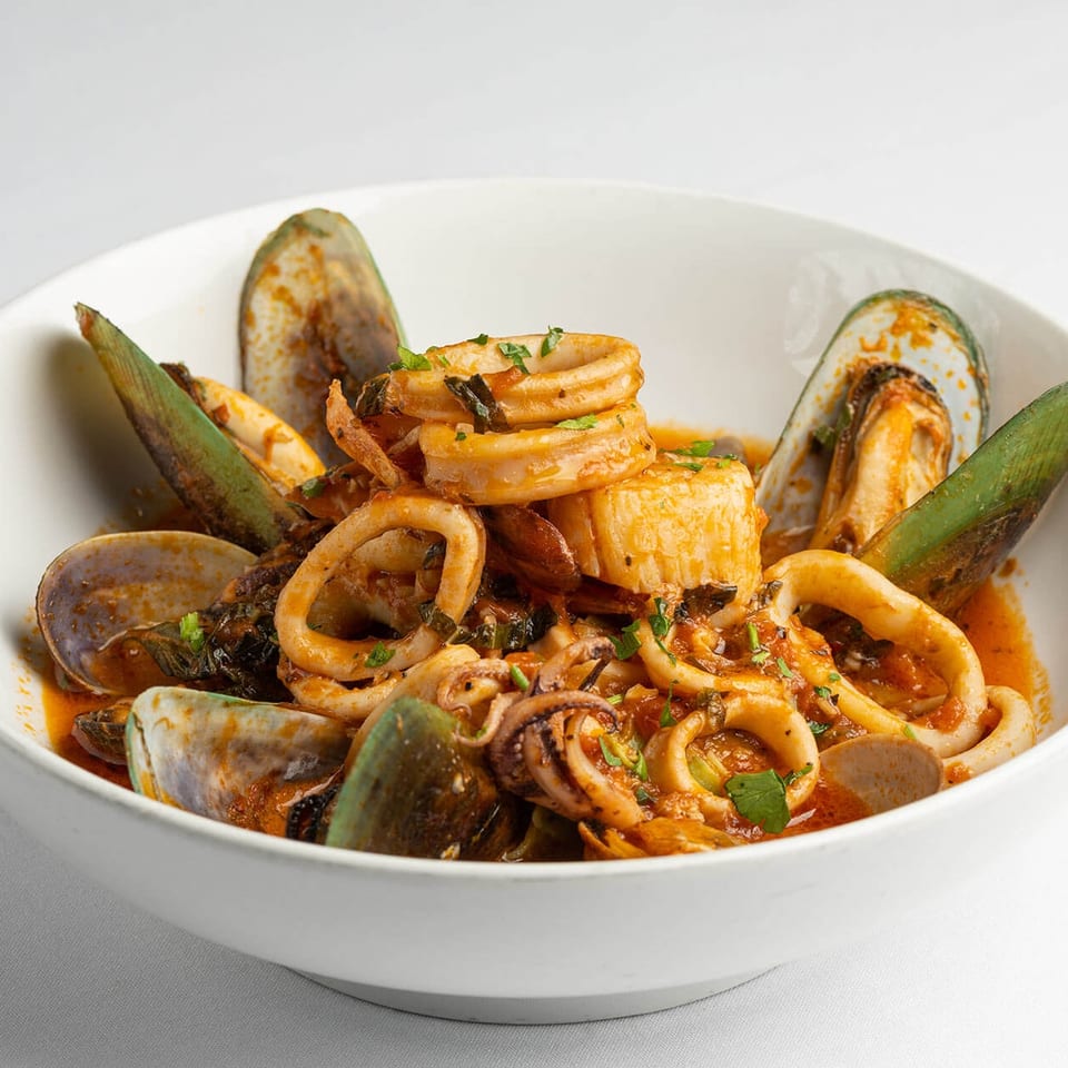 Seafood in tomato broth